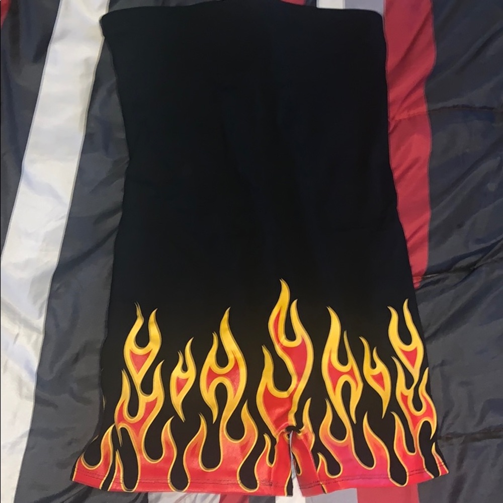 Firey romper . Never been worn .